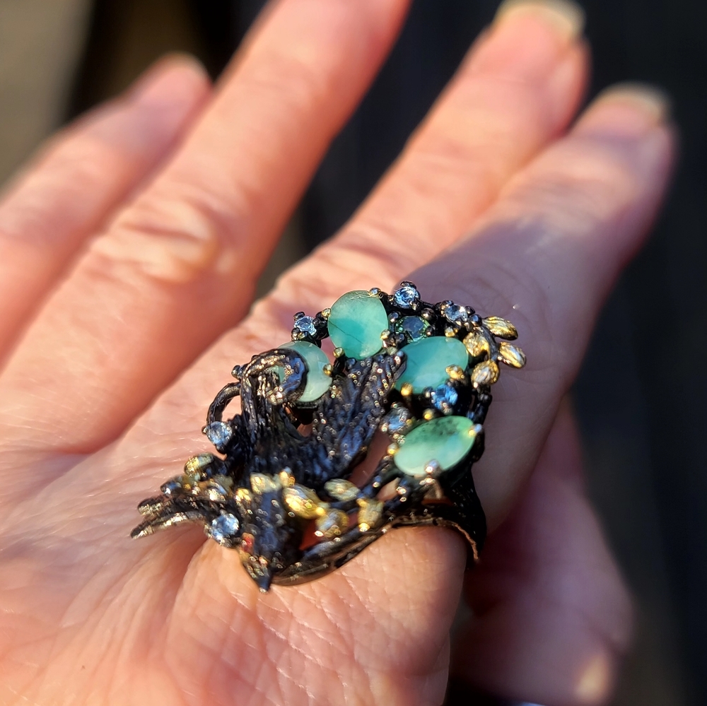 Gorgeous Sterling & Rhodium bird in a nest of Emeralds Peridot & Aquamarines